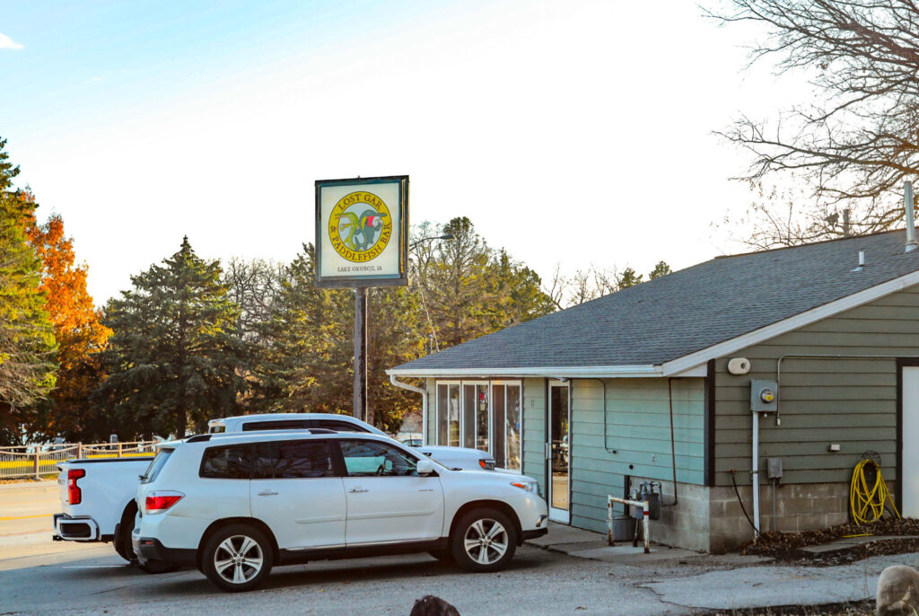 a photo of store front and signage of Lost Gar & Paddlefish Bar