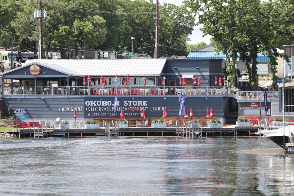 a photo of The Okoboji Store in front of the lake