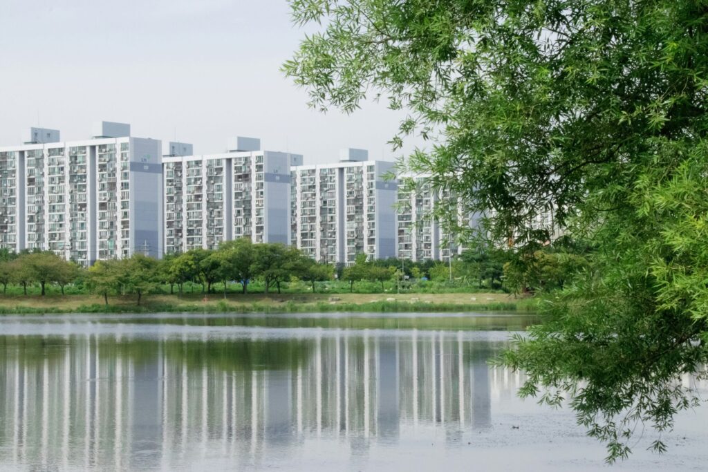 a body of water surrounded by tall buildings