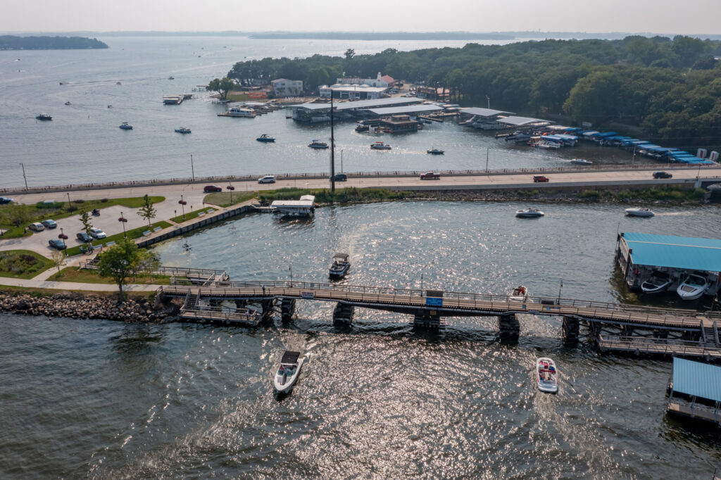 Boats Going from West Lake to East Lake Okoboji, by Okoboji Realty